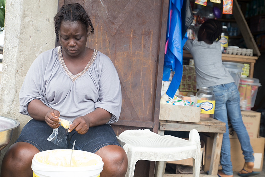 Jacqueline Clinton used the loan she received from Stewart to expand the inventory in her small store. The proceeds support her and her five children (including her 9-year-old daughter, Moseline, pictured here). She’s open six days a week but takes Sundays off for church.