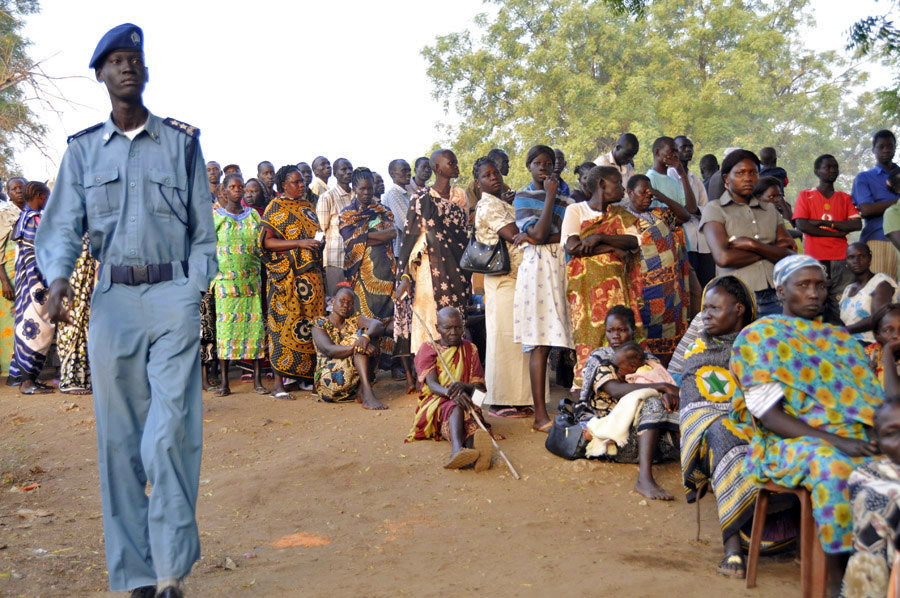 In the Lologo Market polling station in Juba, hundreds of men and women queued to vote on day one of the referendum. Some people held rolled up mattresses next to them - they had spent the night to be the first to vote.