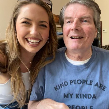 Father and Daughter smiling