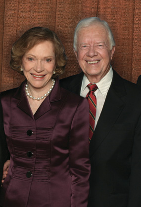 Former U.S. President Jimmy Carter and his wife, Rosalynn, pose at the Atlanta Symphony Hall in the Woodruff Arts Center in Atlanta, Georgia, at an event celebrating President Carter's Nobel Peace Prize.