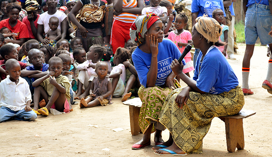 In Bong County, Liberia, members of a drama troupe perform an educational skit about marriage and property rights. The Carter Center is working with the government of Liberia to help the country rebuild its judicial system following a long and devastating civil war.