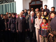 The Carters pose with villagers in Hong'an, China.